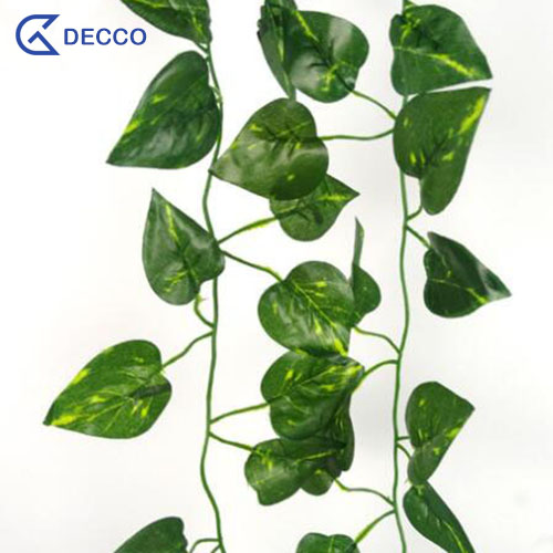 Artificial green cirrus leaves vine